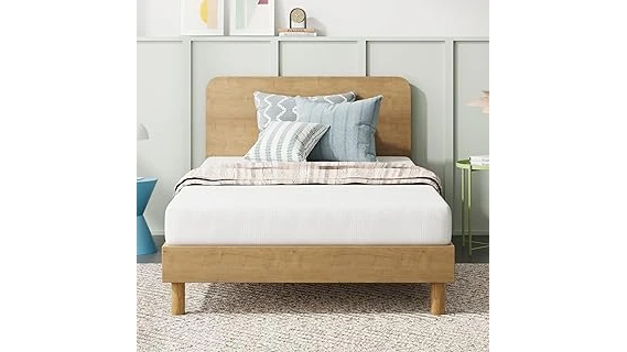 The image shows a comfortable bedroom scene with several mattresses arranged to highlight durability.