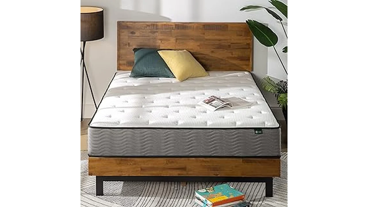 The image shows a comfortable king-size mattress with plush pillows, representing the Best 12 Mattress King selection.