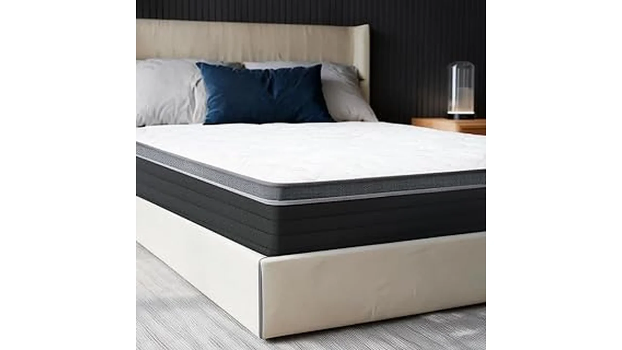 The image shows a plush mattress with crisp white bedding, suggesting the Best 31 Mattress Hotel Quality experience.