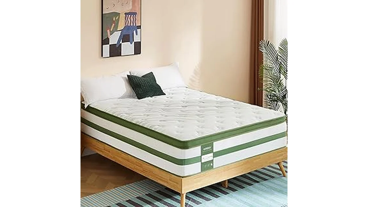 The image shows a comfortable, inviting bed with a thick, supportive firm mattress as its centerpiece.