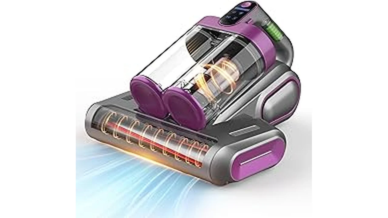 This image shows a hand holding a sleek mattress vacuum cleaner with a UV light feature.